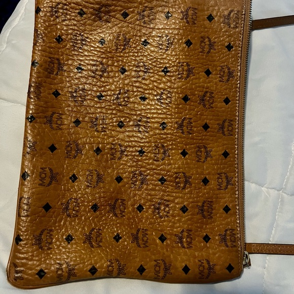 MCM crossbody has some wear in the bottom corners, not visible while wearing. - Picture 3 of 6